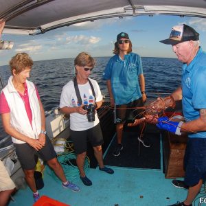 Al gives a lesson on crayfishing