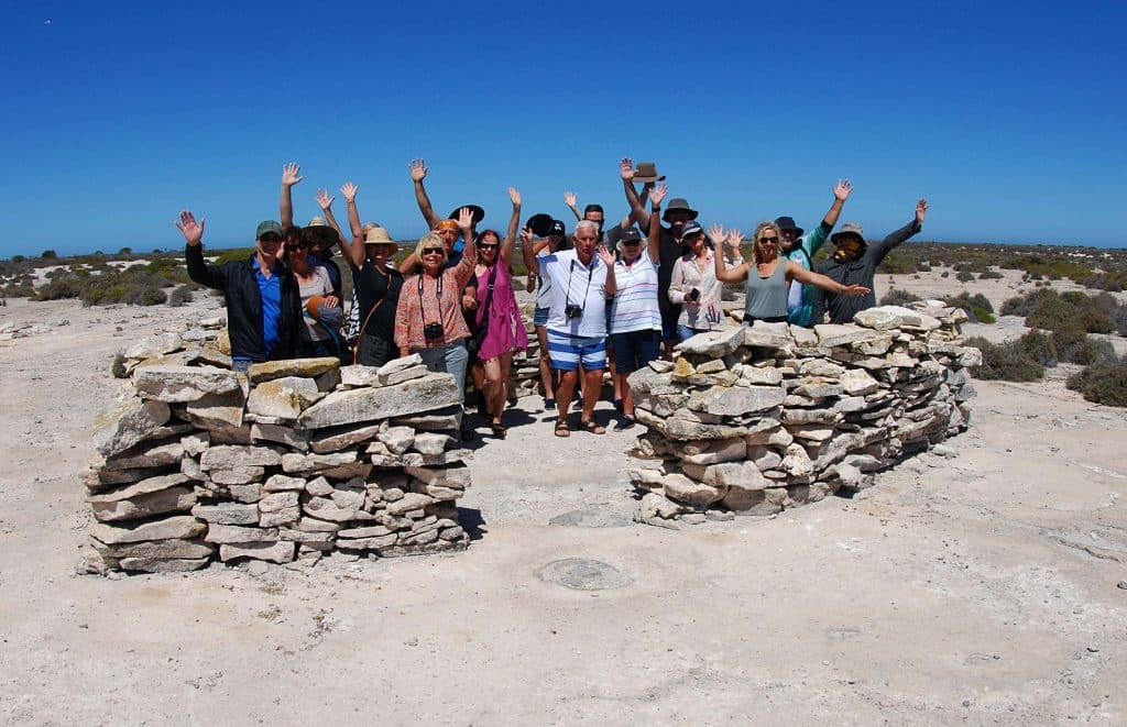 a group of people posing for a photo